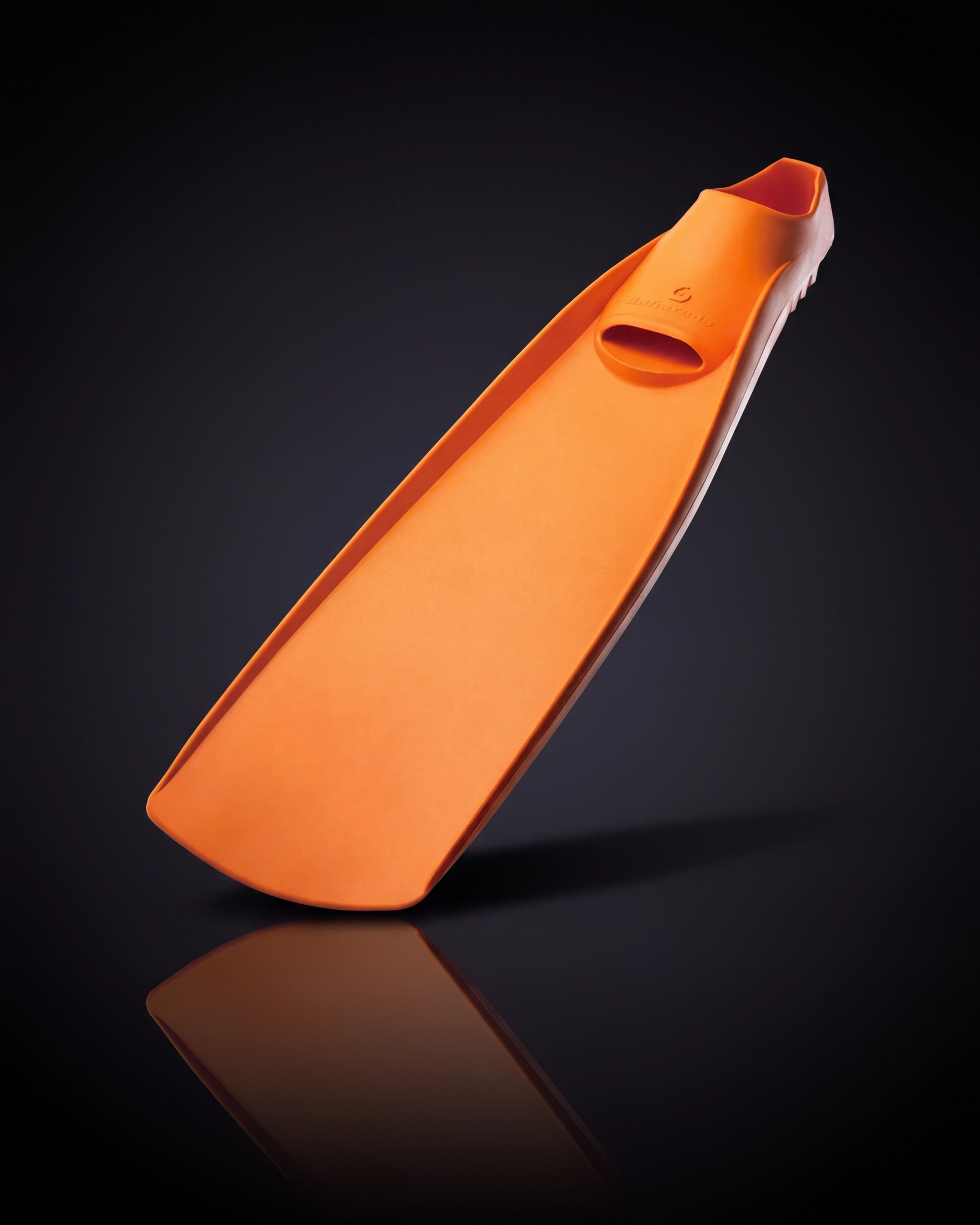 GULL BARRACUDA fin in Sunshine Orange, angled to show the foot pocket and long rubber blade